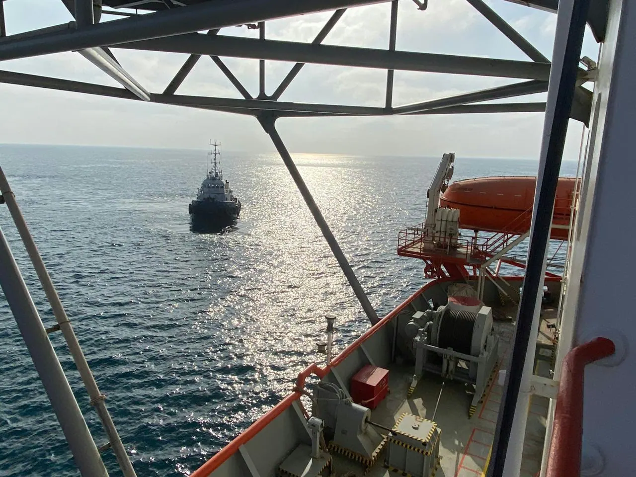Tug seen from a crane on board a vessel